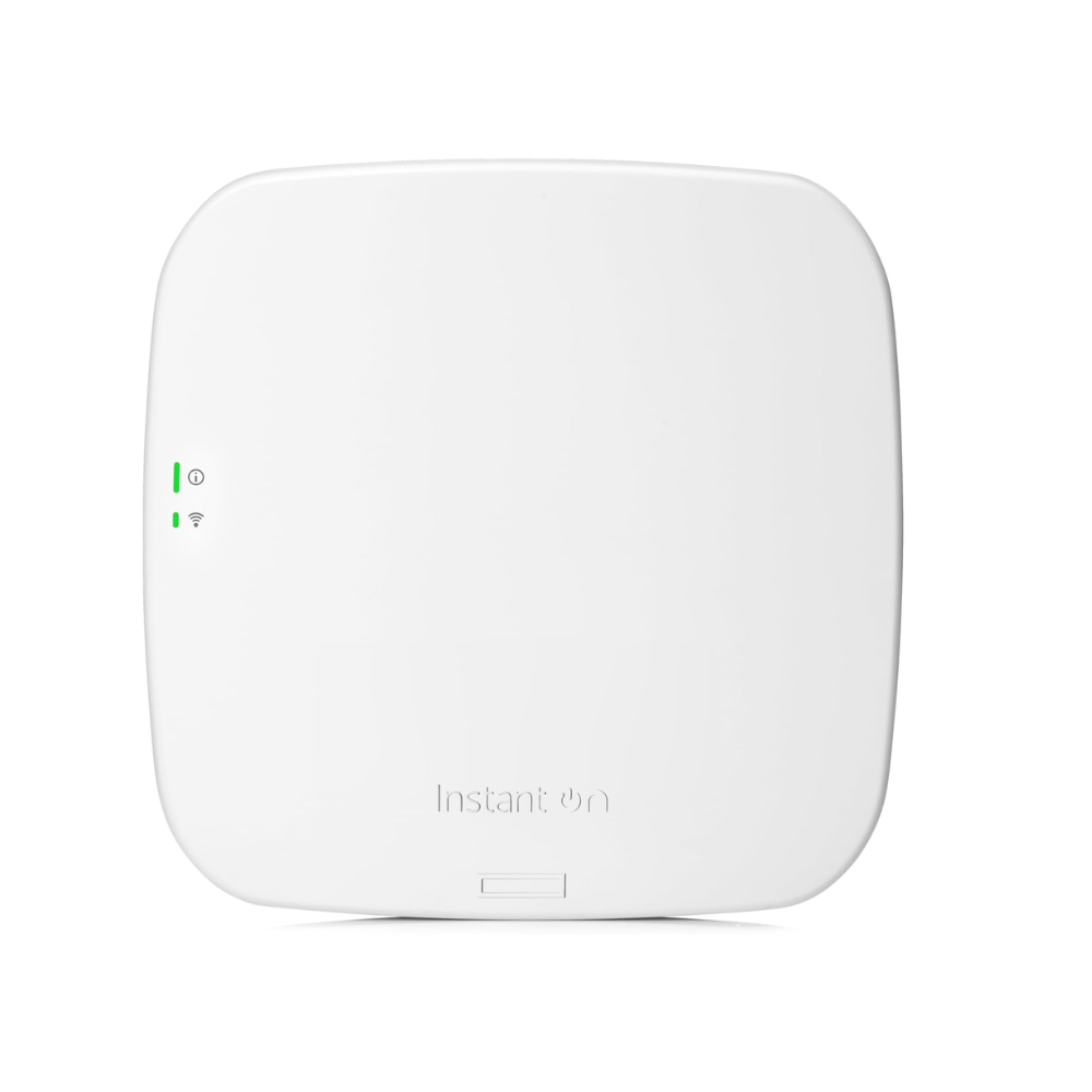 "Front view of white Aruba Instant On AP12 (R3J23A) indoor access point, showing its sleek square design with status LEDs and included DC power adapter."