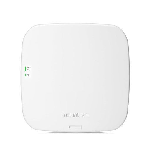 "Front view of white Aruba Instant On AP12 (R3J23A) indoor access point, showing its sleek square design with status LEDs and included DC power adapter."